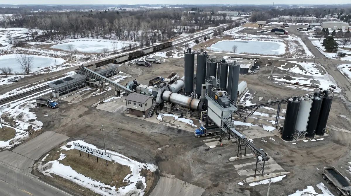 Commercial hot mix asphalt plant with drum mixer and storage silos serving the Maple Grove Minnesota area